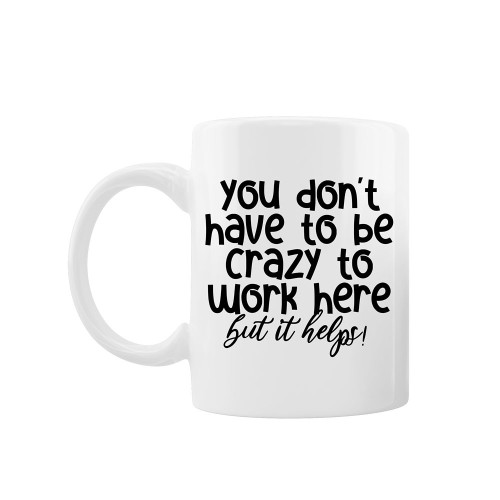 Cana personalizata "You don't have to be crazy to work here, but it helps!", Oktane, ceramica alba, 330 ml